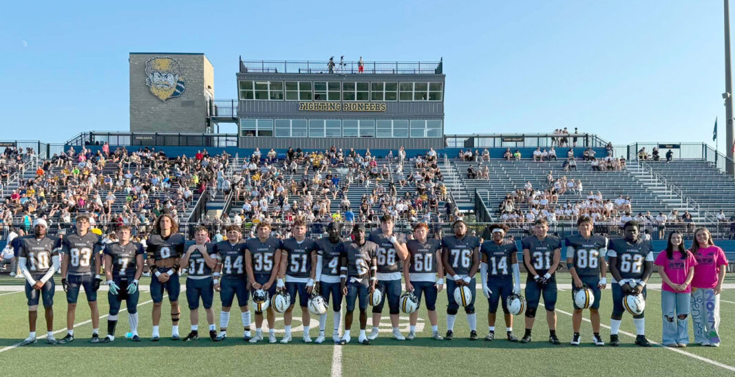 Pioneers open season on the gridiron by topping Olympians